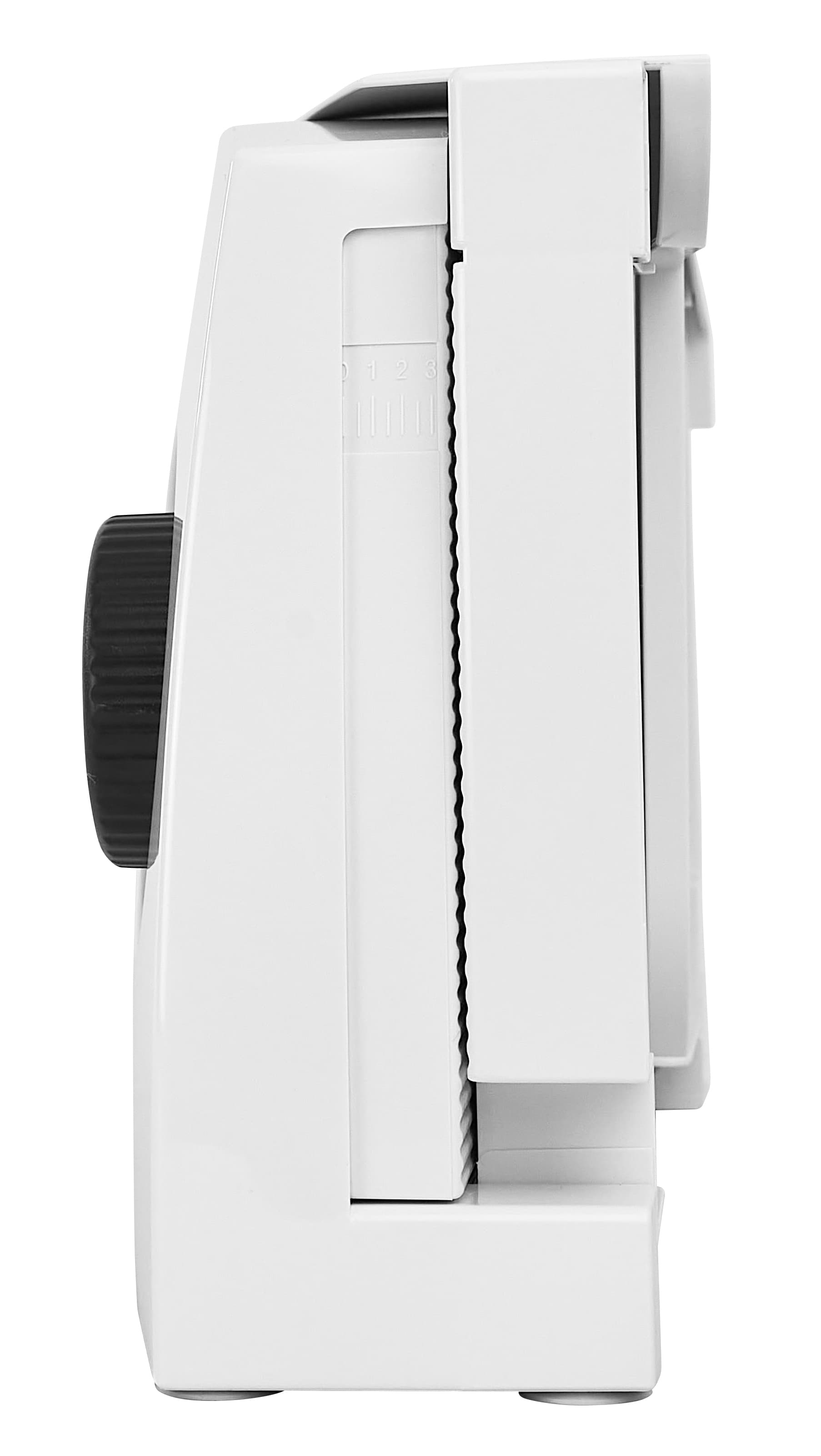 White plastic food slicer, from the side