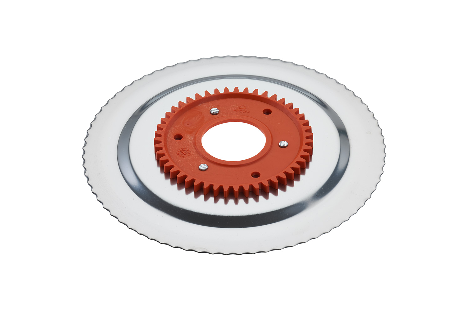Serrated circular blade with electropolished surface and an orange gear Serrated circular blade with electropolished surface and an orange gear