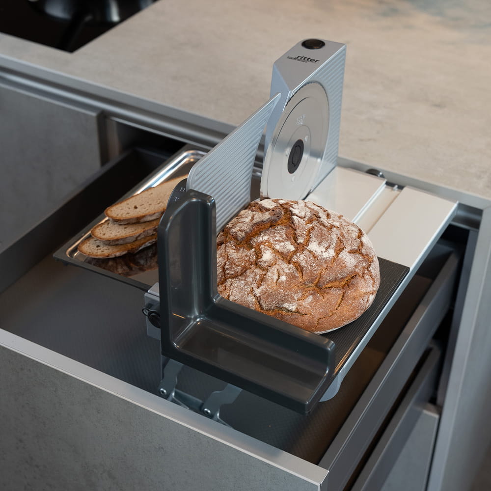 Electric built-in all food slicer in modern kitchen Electric built-in all food slicer in modern kitchen