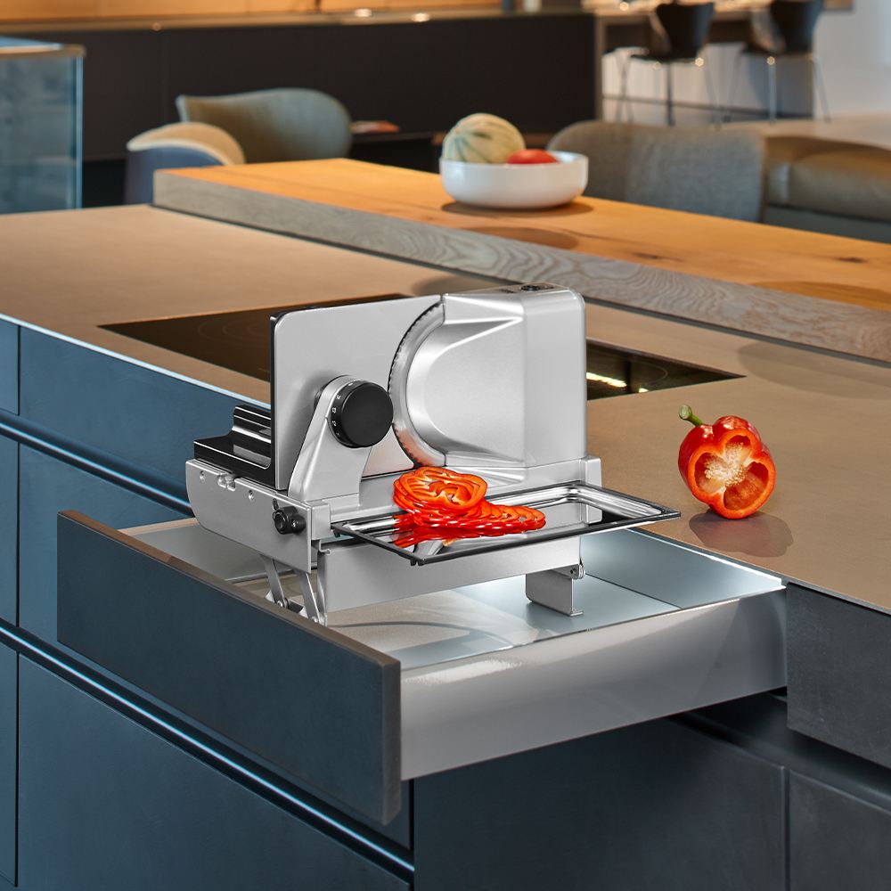 Electric built-in all food slicer in modern kitchen Electric built-in all food slicer in modern kitchen