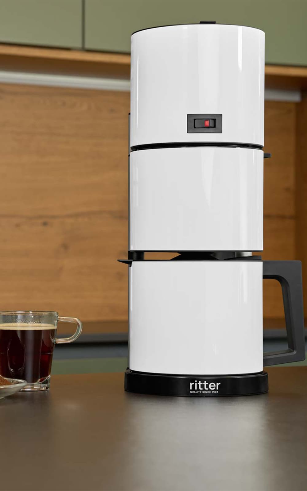 White coffee machine in a modern kitchen White coffee machine in a modern kitchen