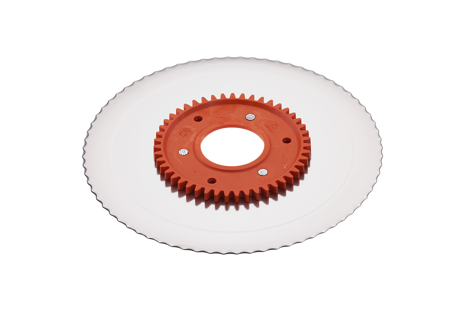 Serrated circular blade with electropolished surface and an orange gear