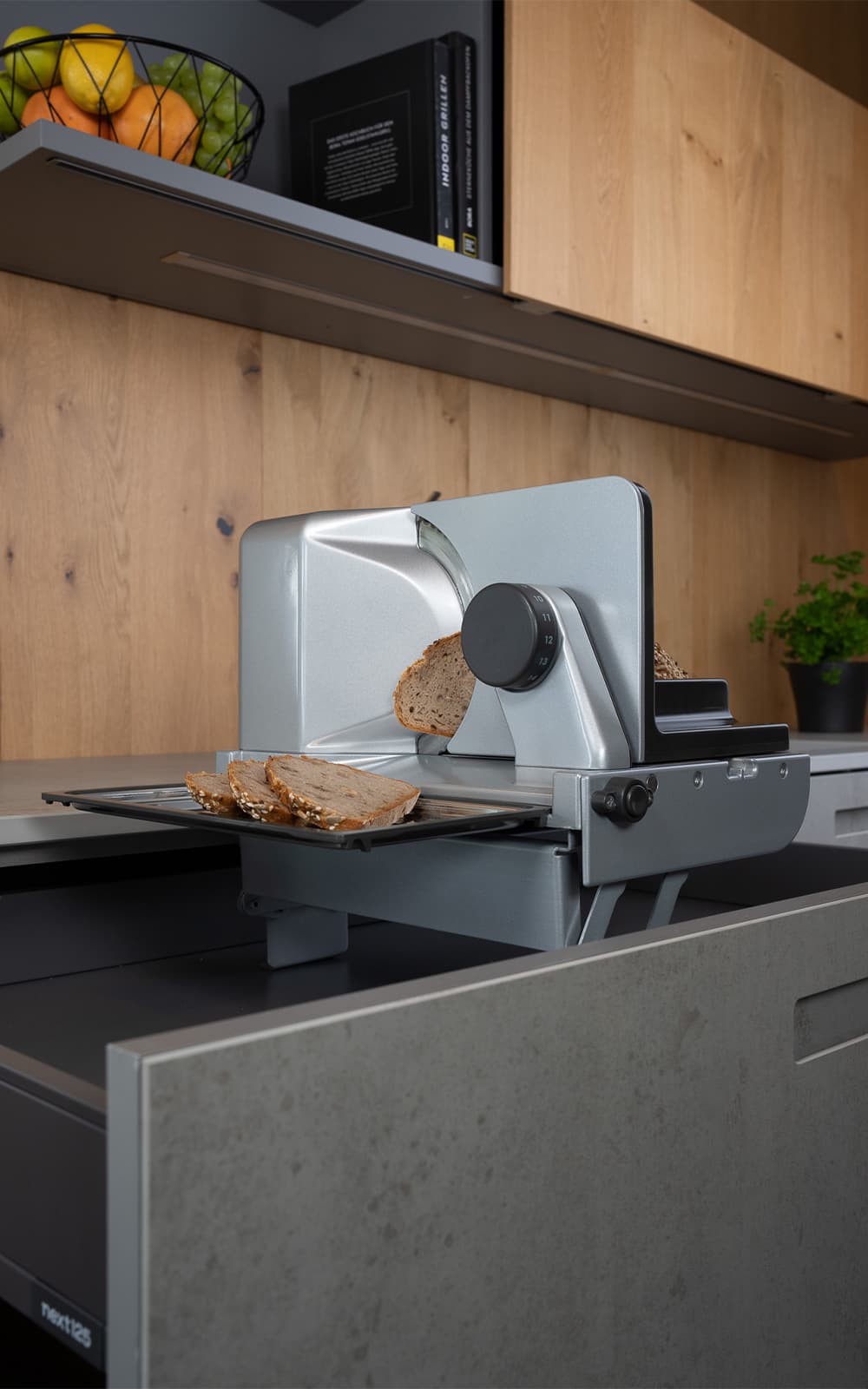 Built-in food slicer in modern kitchen drawer Built-in food slicer in modern kitchen drawer