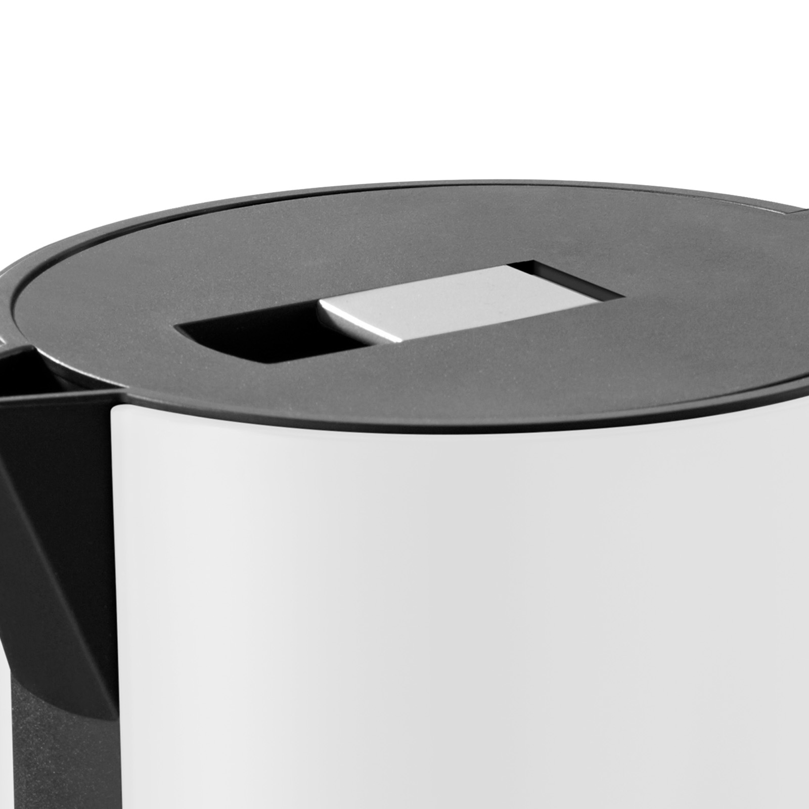 The locking mechanism of the white kettle.