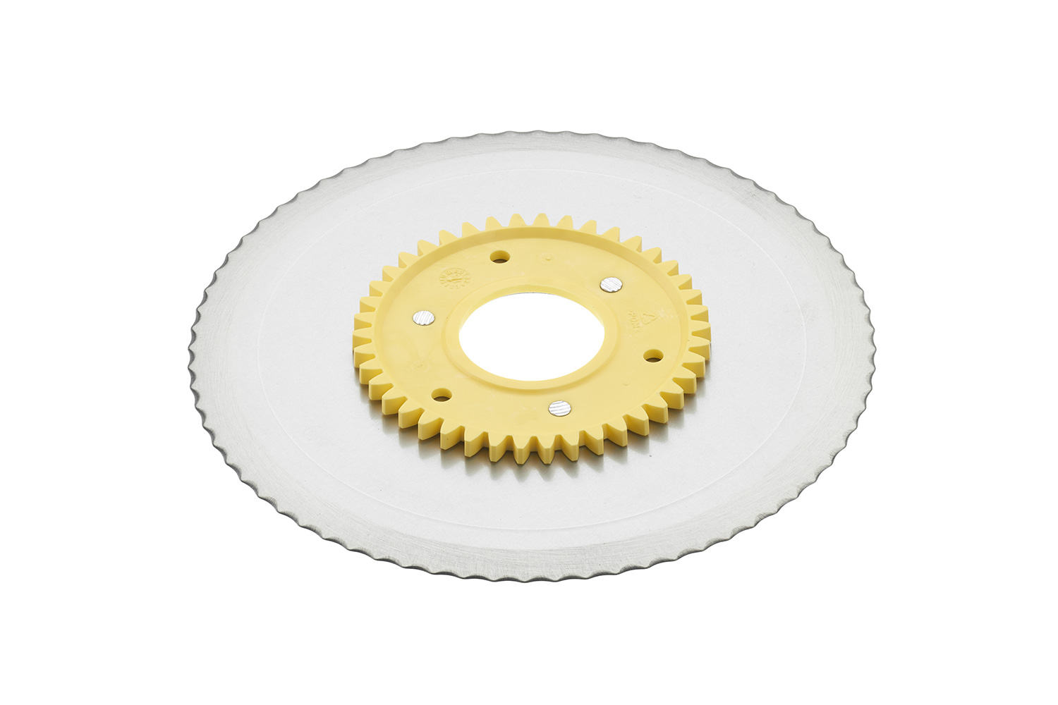 Serrated circular blade with a yellow gear Serrated circular blade with a yellow gear