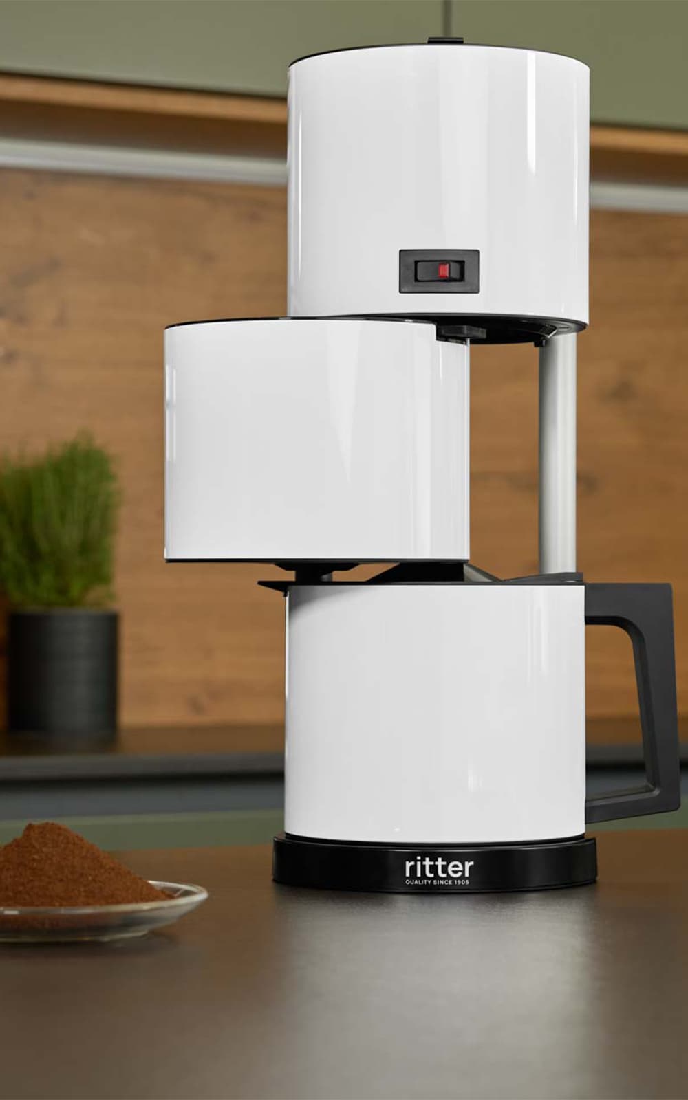 White coffee machine in a modern kitchen White coffee machine in a modern kitchen