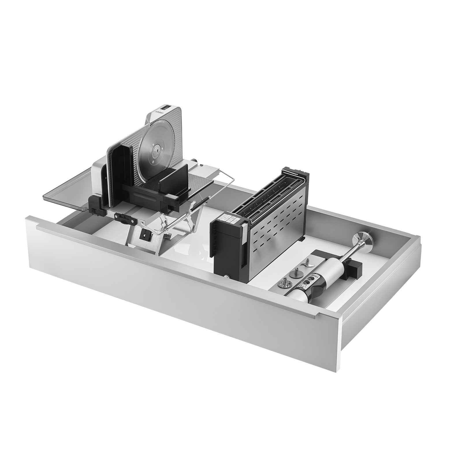 Ein Bild einer Schublade, mit einer Einbau-Kombination aus einem Einbau-Stabmixer, einem Einbau-Toaster und einem Einbau-Allesschneider, mit weißem Hintergrund.