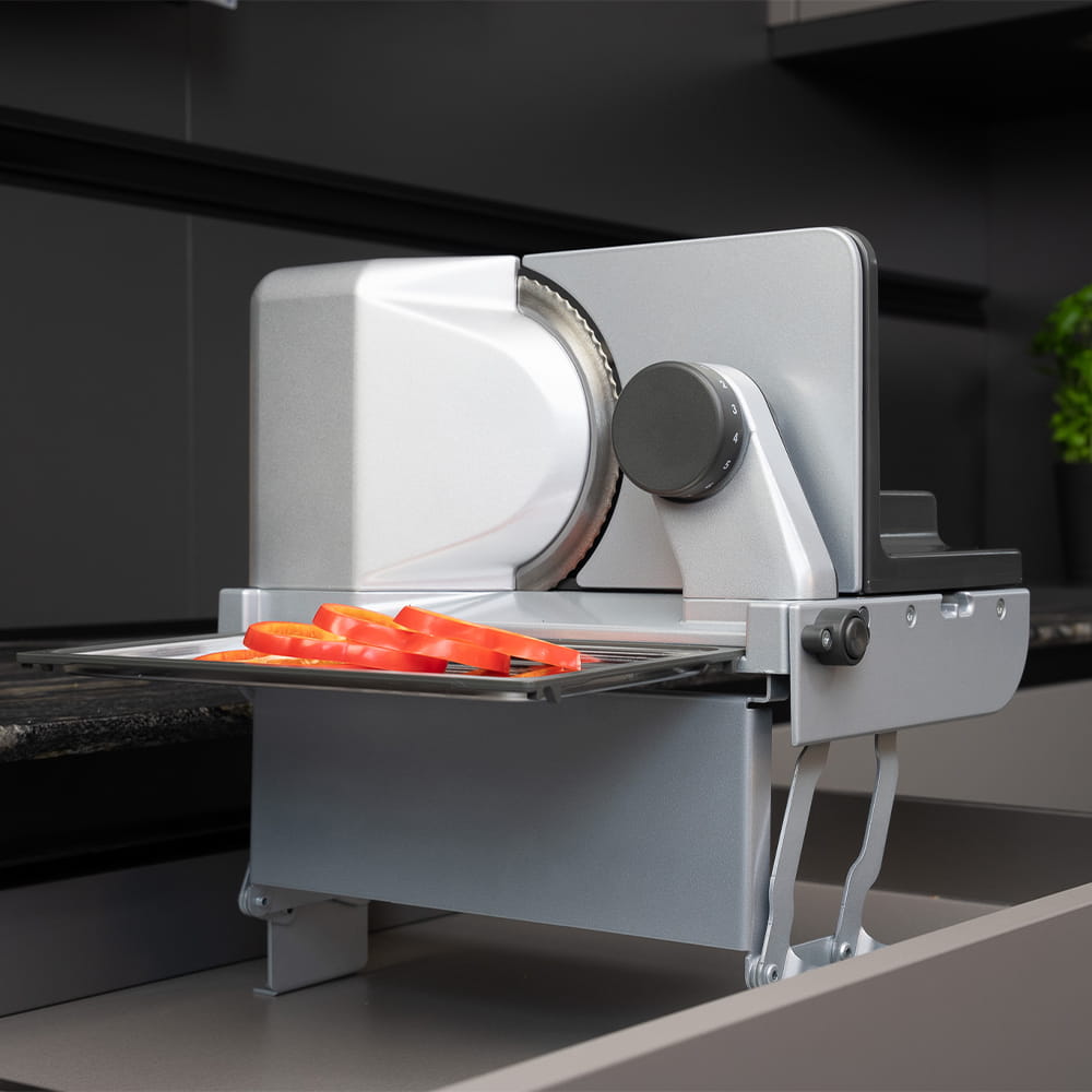 Electric built-in all food slicer in modern kitchen Electric built-in all food slicer in modern kitchen