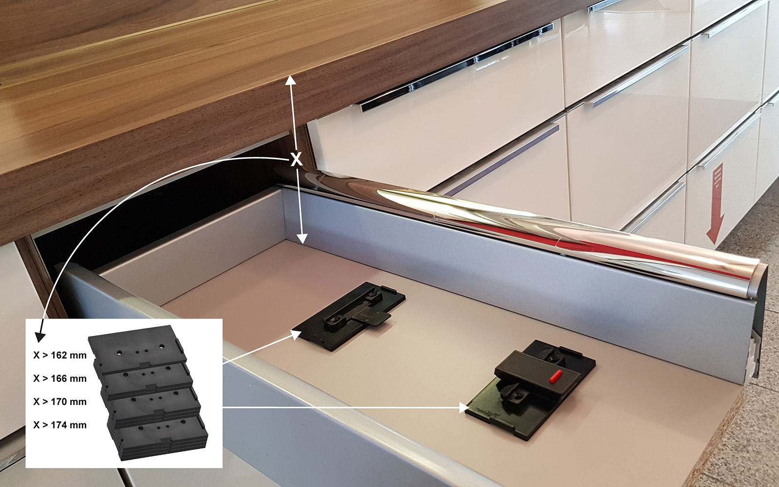 A picture of a drawer with base plates installed in it. A picture of a drawer with base plates installed in it.