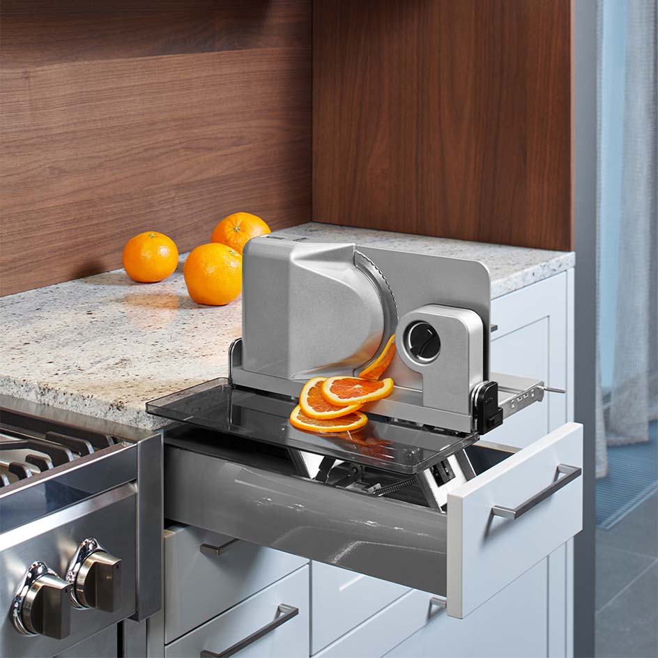 Electric built-in all food slicer in modern kitchen Electric built-in all food slicer in modern kitchen