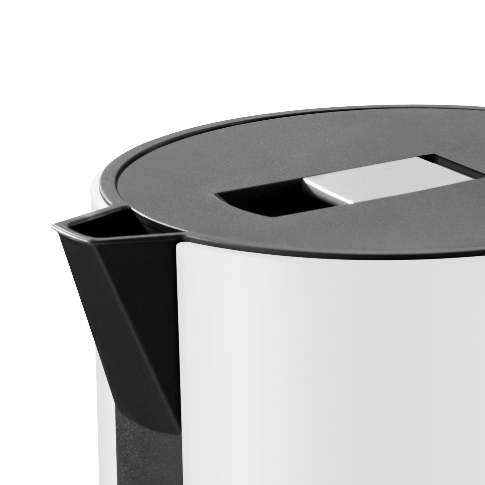 The spout of the white kettle.