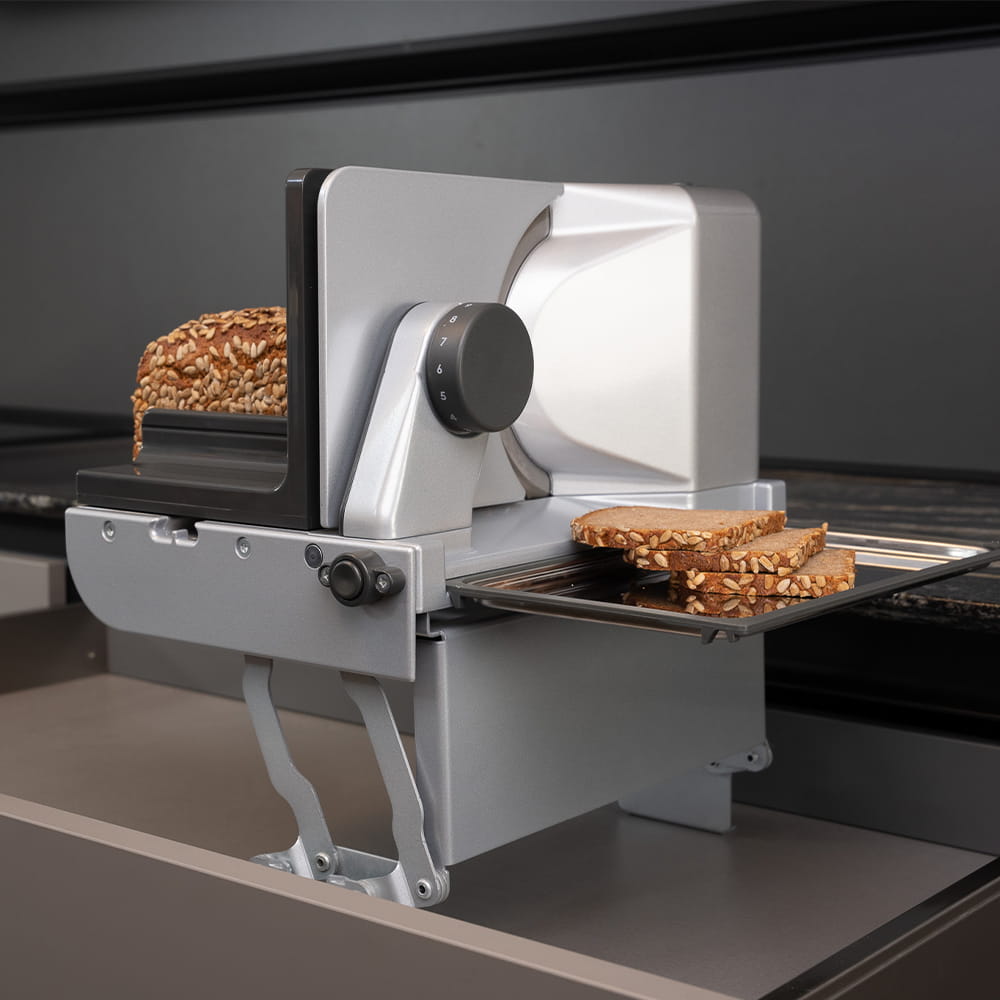 Electric built-in all food slicer in modern kitchen Electric built-in all food slicer in modern kitchen