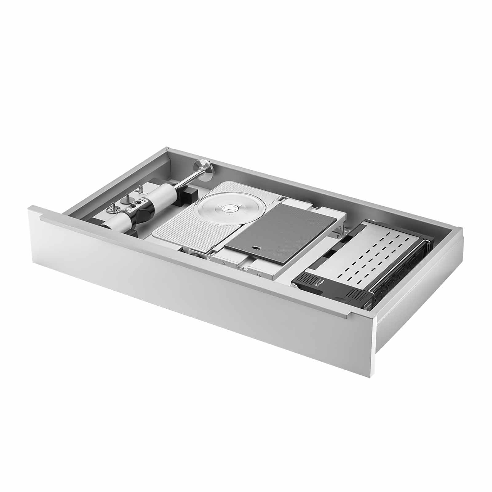 Ein Bild einer Schublade, mit einer Einbau-Kombination aus einem Einbau-Stabmixer, einem Einbau-Toaster und einem rechtsgeführten Einbau-Allesschneider, mit weißem Hintergrund.